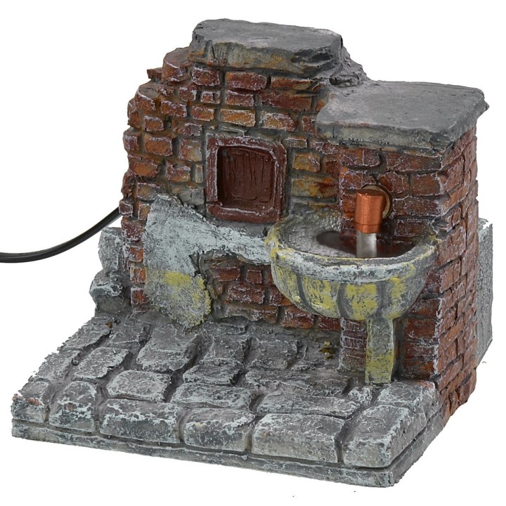 Functioning fountain with brick effect wall in resin cm