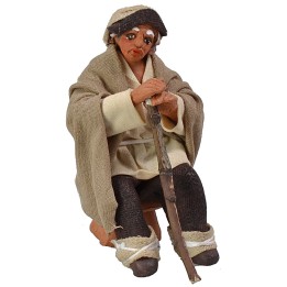 Seated shepherd with stick 10 cm Lux series