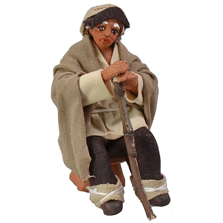 Seated shepherd with stick 10 cm Lux series
