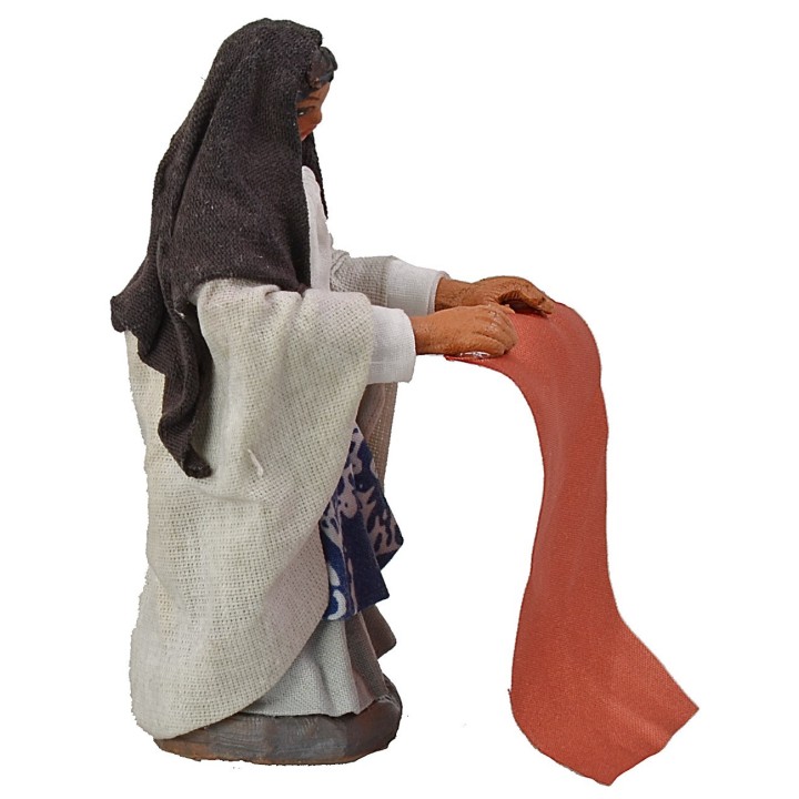 Woman beating clothes 10 cm