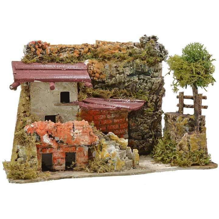 Casa stuccata con rimessa legna cm 27x12x18 h.