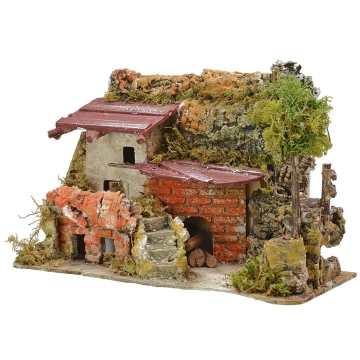 The house filled with throw-wood cm 27x12x18 h.