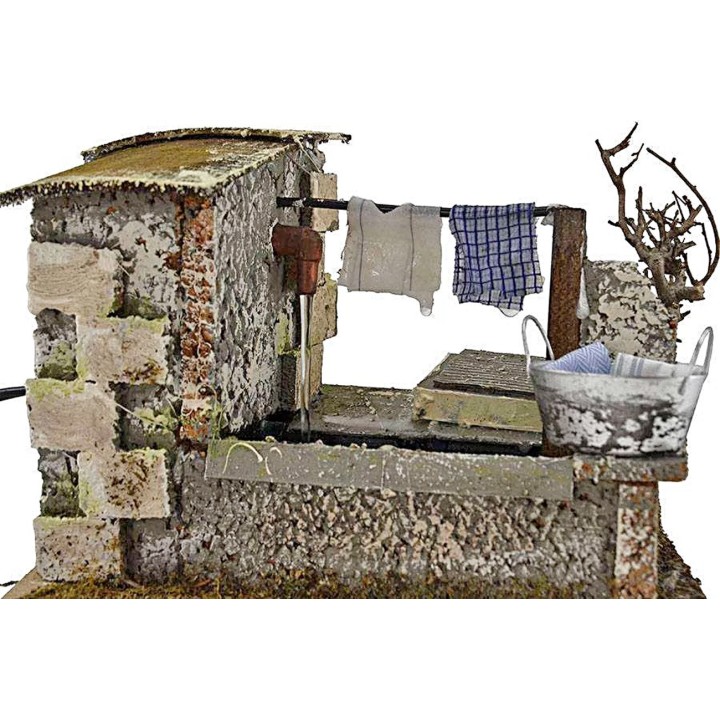 Stenditoio gocciolante con fontana cm 20x14x13 h.