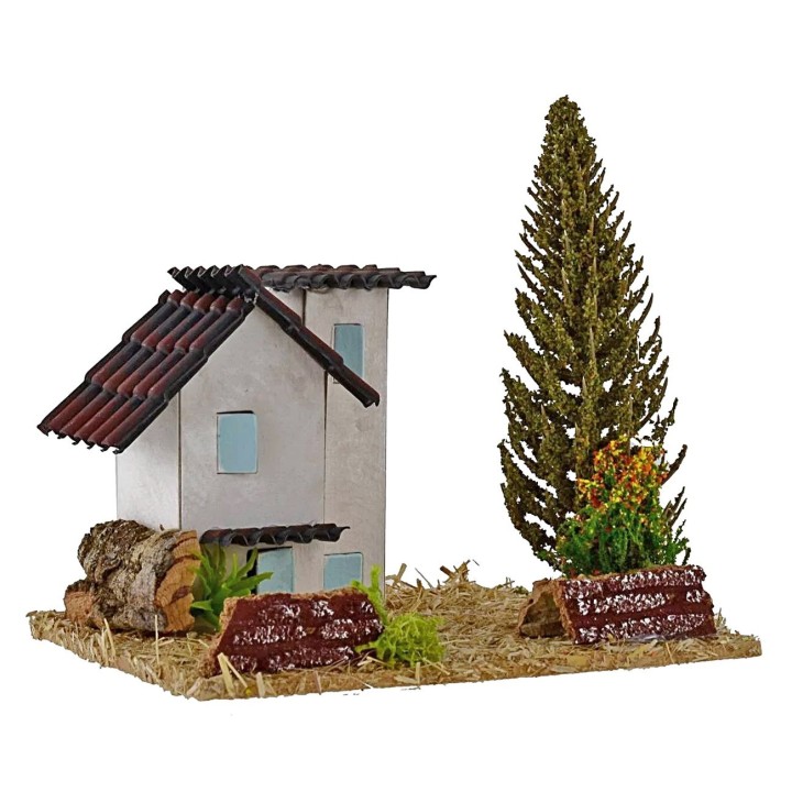 Casas para belén con árbol de 13,5x13,5x9 cm de altura.
