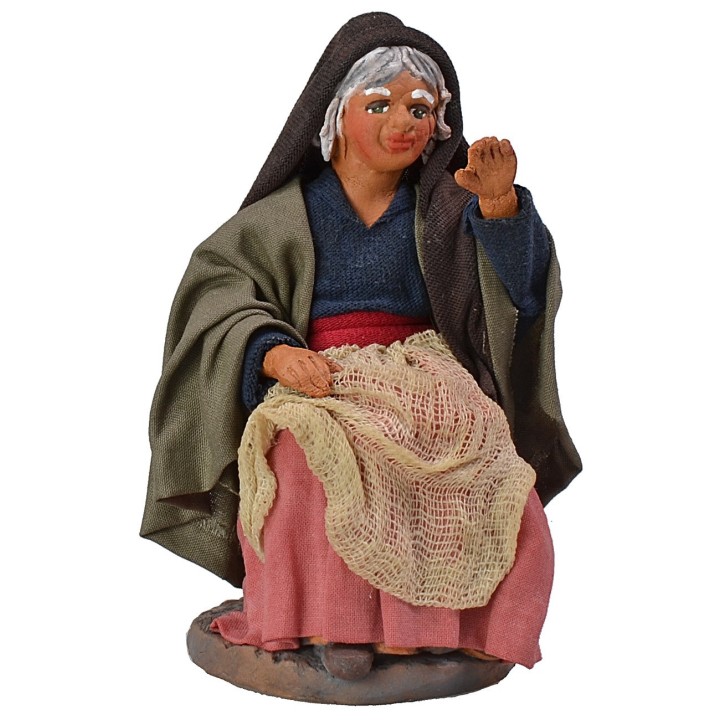 Mujer sentada que dialoga serie12 cm