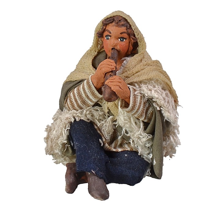 Boy sitting with pipe 12 cm Lux series