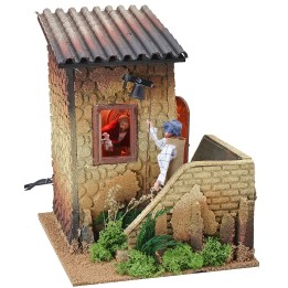 Double movement illuminated house with man ringing the bell and
