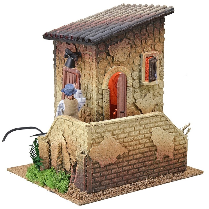 Double movement illuminated house with man ringing the bell and