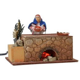 Mujer cocinando en movimiento 16x10x12 h