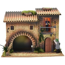 Illuminated house with moving lamplighter 12 cm and woman