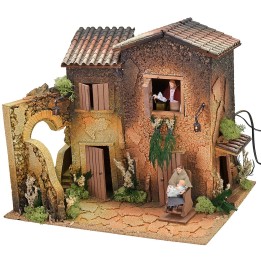 Illuminated village with two women 12 cm in movement cm
