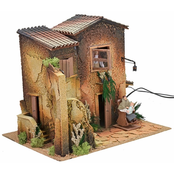 Illuminated village with two women 12 cm in movement cm