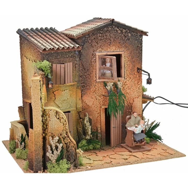 Illuminated village with two women 12 cm in movement cm