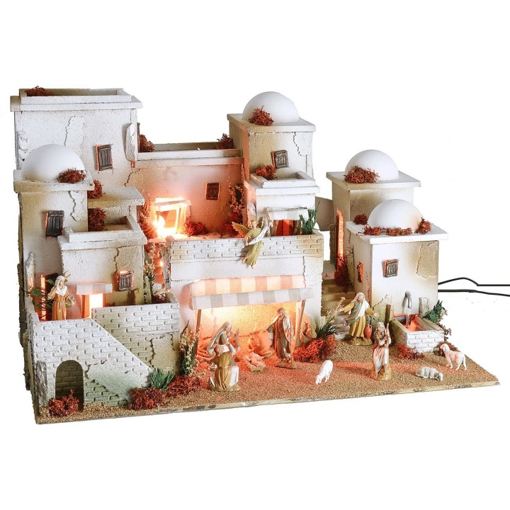 Nativity scene in Palestinian style complete with lights, fountain