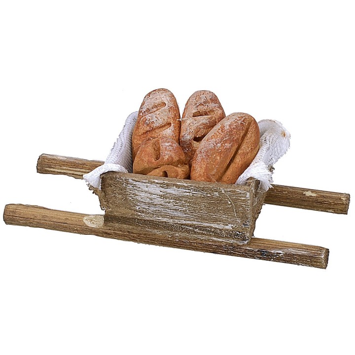 Maniella de madera con pan