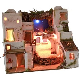 Palestinian Nativity scene illuminated with starry sky and oven cm