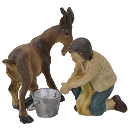 Joven ordeñador de cabra en resina serie 9 cm