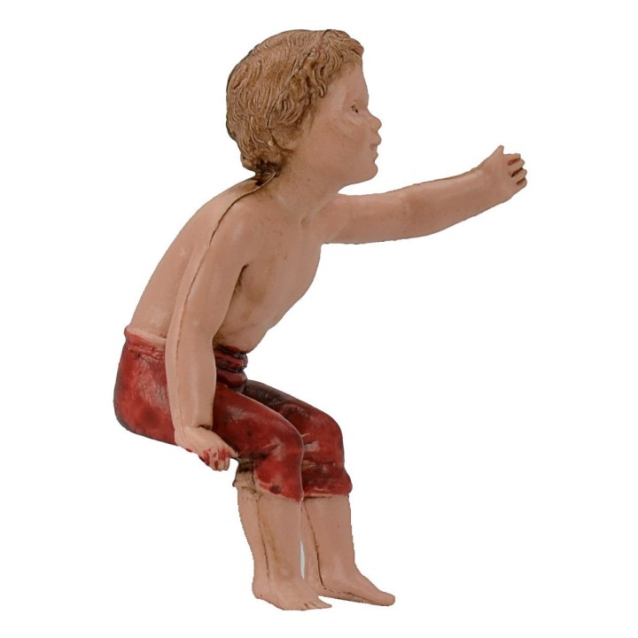 Niño sentado serie 10 cm Landi Moranduzzo