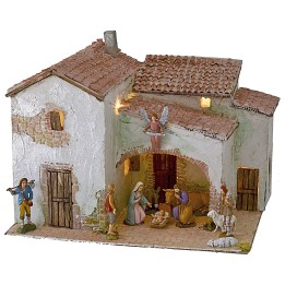 Illuminated stucco village complete with figurines cm 40x30x31 h