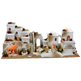Arab nativity scene with lights, double-tap fountain, and fire