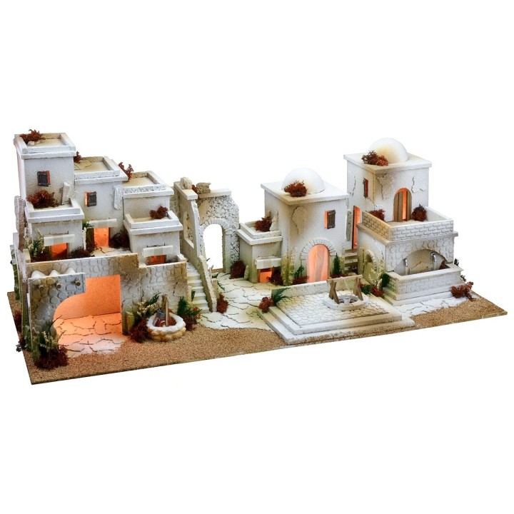 Arab nativity scene with lights, double-tap fountain, and fire