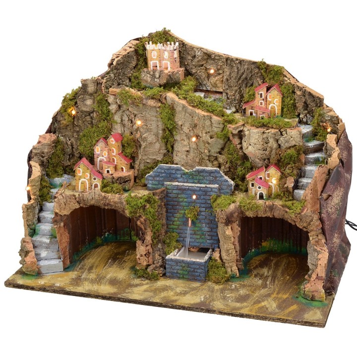 Illuminated nativity scene with working fountain and cave for statues