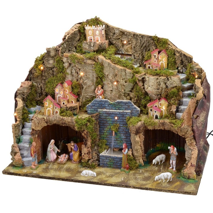 Illuminated nativity scene with working fountain and complete grotto
