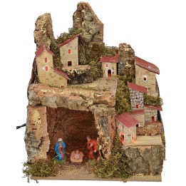 Illuminated nativity scene with landscape and cave complete with Nativity
