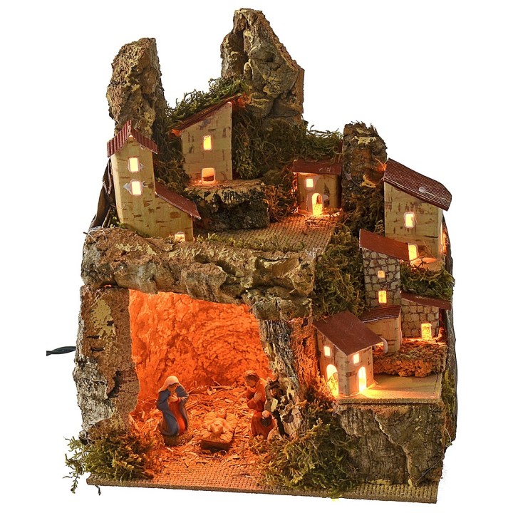 Belén iluminado con paisaje y cueva completa de Natividad