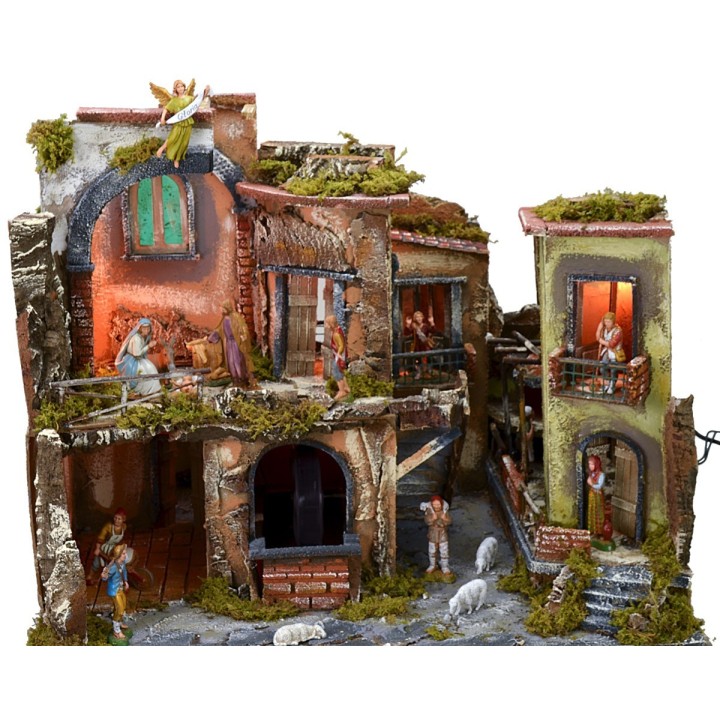 Presepe completo di statue con borgo illuminato, forno e