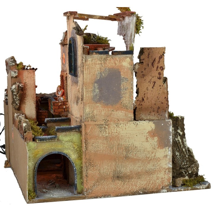 Presepe completo di statue con borgo illuminato, forno e