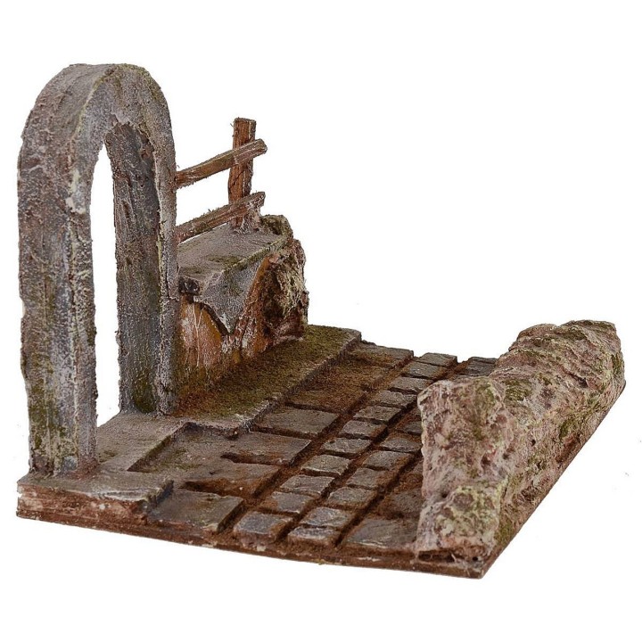 Road with arch-door and detached fence raised for presepe