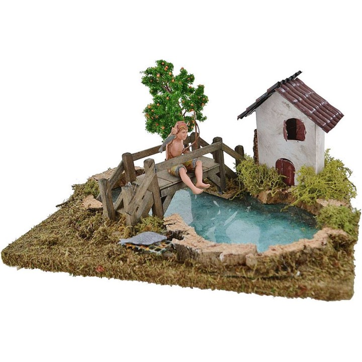 Pond with depth effect fisherman Landi, tree and house