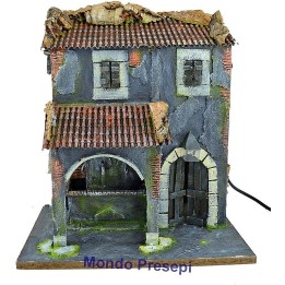 Casa con fuente de 3 salidas de agua y farola