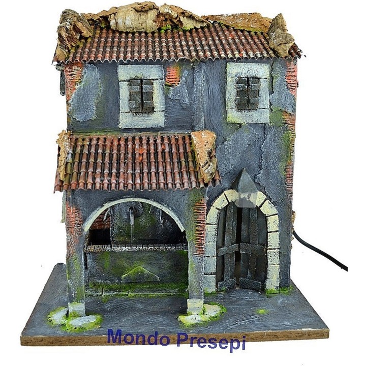 Casa con fontana a 3 uscite d'acqua e lampione