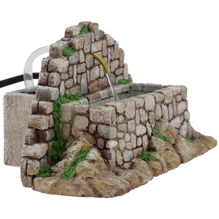 Fuente de montaña de piedras para belén con bomba de
