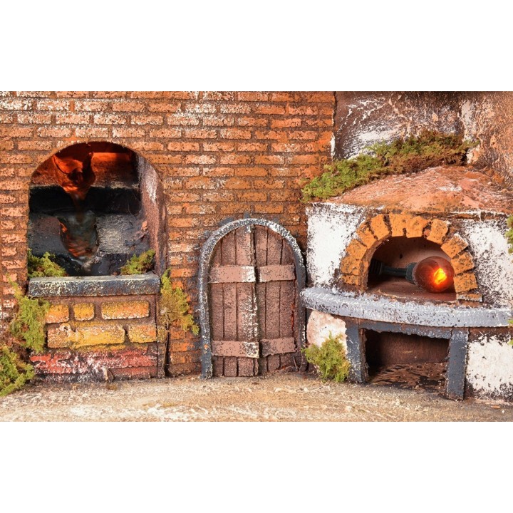 Neapolitan village illuminated with oven, windmill, and waterfall