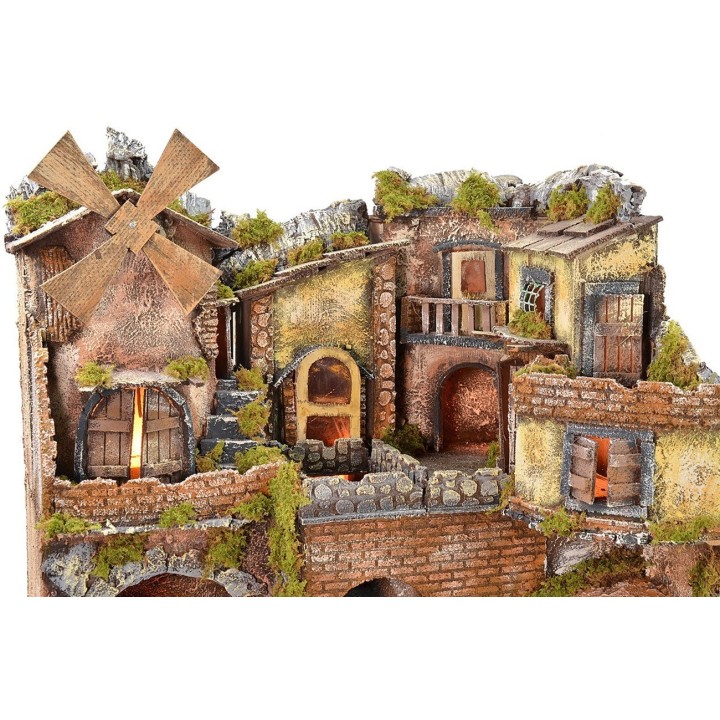 Aldea napolitana iluminada con horno, molino de viento y cascada