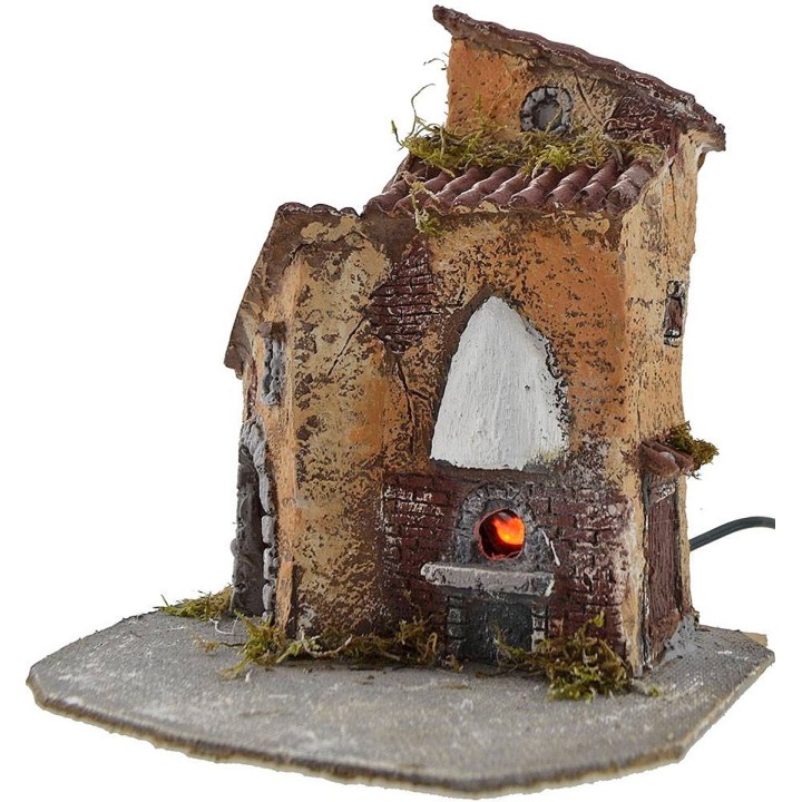 Casa in resina con forno funzionante cm 19x15,5x22 h.