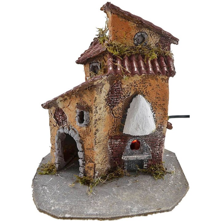 Casa in resina con forno funzionante cm 19x15,5x22 h.
