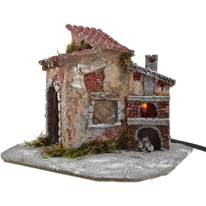 Casa in resina con forno funzionante cm 19x16x15 h.