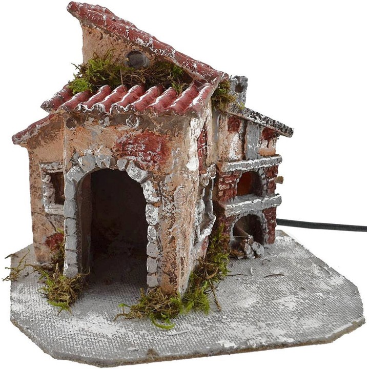 Casa in resina con forno funzionante cm 19x16x15 h.