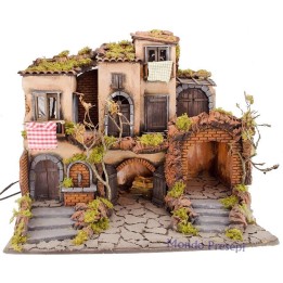 18th-century Neapolitan Nativity scene with illuminated village and fountain