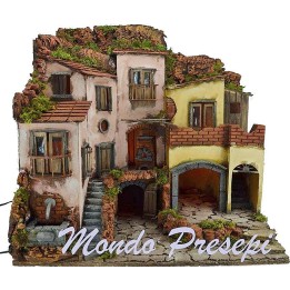 Nativity scene with illuminated village with fountain 60x40