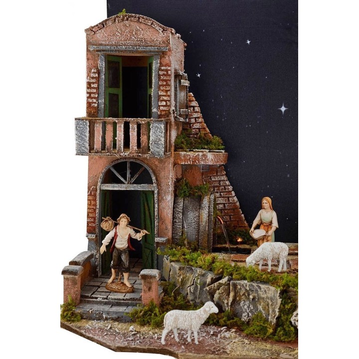 Complete nativity scene with Landi statues and illuminated starry sky