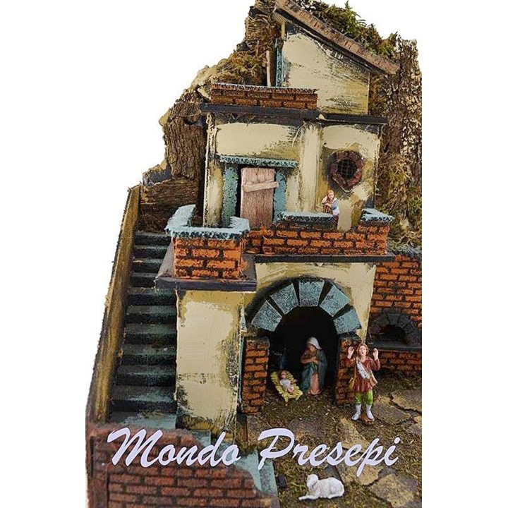 Pesebre con estatuas Landi fuego y luces cm 40x29x44 h.