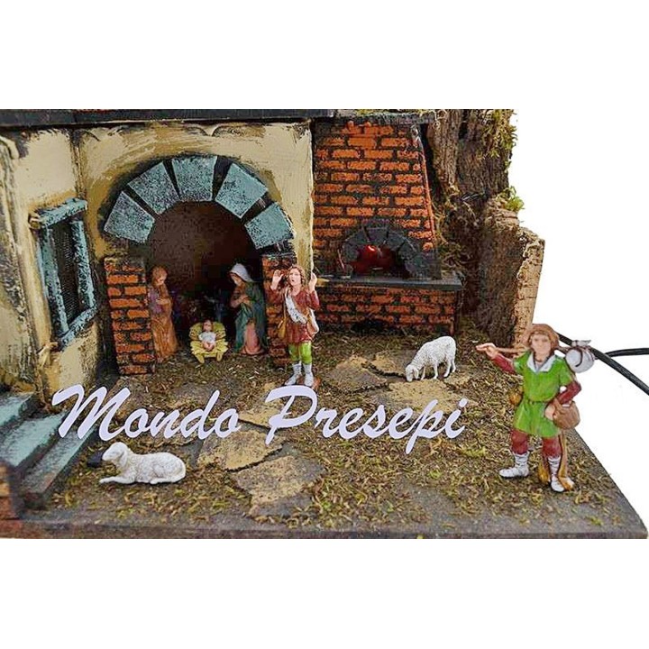 Presepe con statue Landi fuoco e luci cm 40x29x44 h.