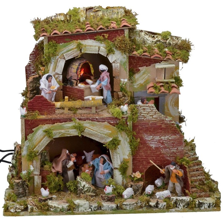 Presepe con statue in movimento cm 57x37x50 h