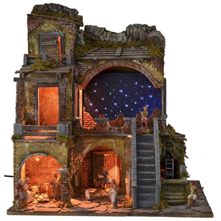 Pesebre iluminado completo con estatuas Landi y cielo estrellado