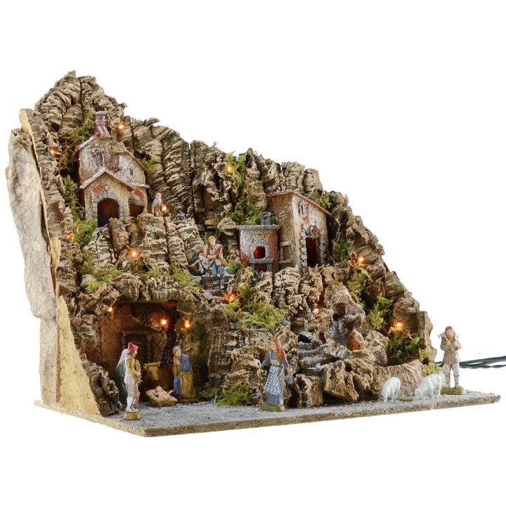 Illuminated nativity scene complete with Landi statues with oven and waterfall